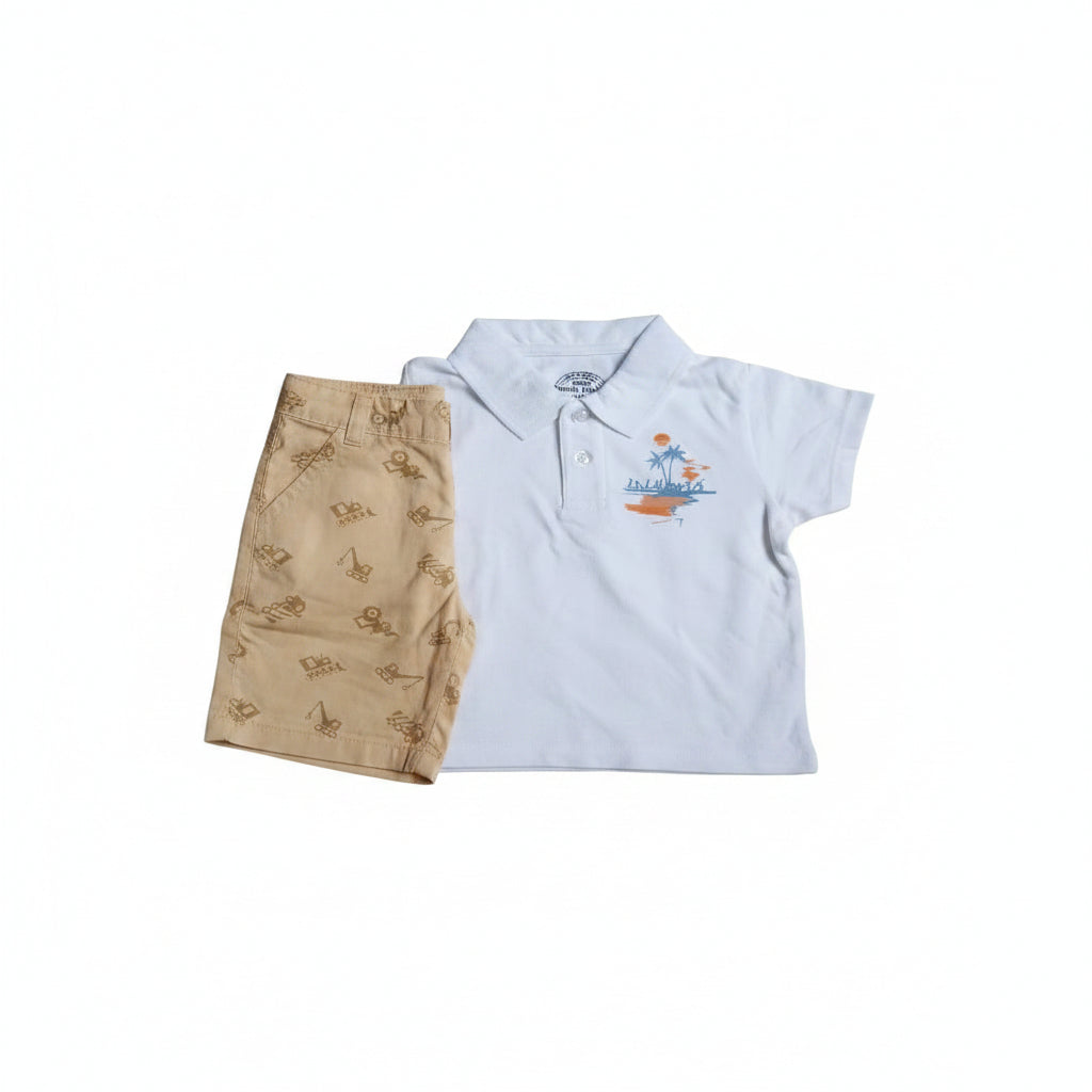 A two-piece kids' outfit set consisting of a white short-sleeve polo shirt with a blue and orange beach graphic on the left chest, and beige shorts with a brown tropical pattern, laid flat on a light-colored surface.